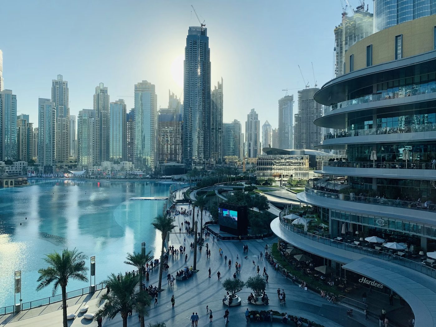 Dubai skyline with tall buildings, water and a modern city vibe